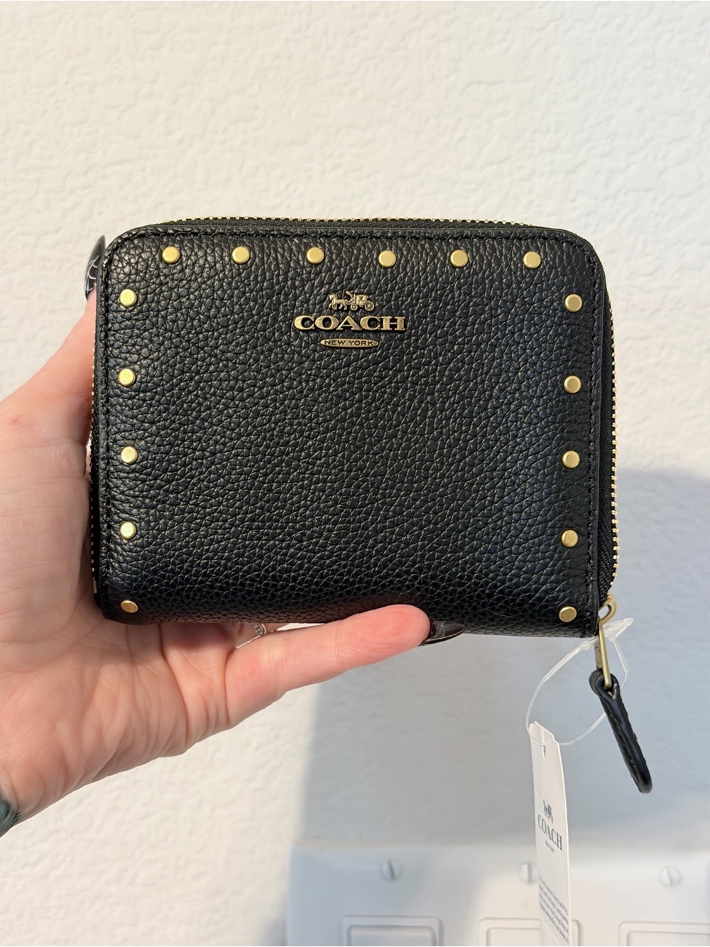 Coach Black Pebbled Leather Zip Wallet with Gold Stud Accents